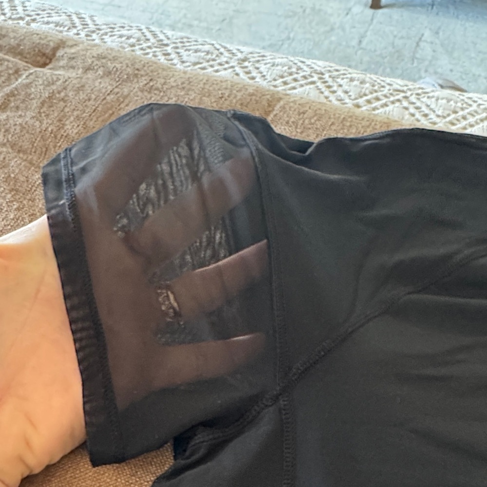 LULYLEMON Black Short-Sleeve with mesh workout top. - Picture 2 of 6